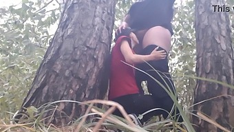 Lesbian Girls Get Hot And Heavy Under A Tree During A Rainstorm